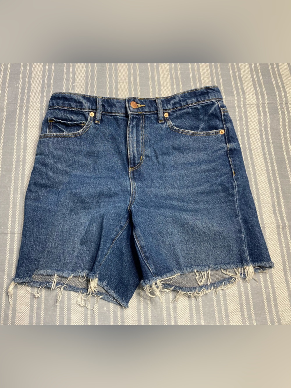 Loft blue “The Boyfriend Short” with frayed hem.
